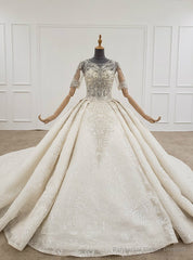 Ivory Ball Gown Tulle Sequins Short Sleeve Backless Beading Wedding Dress