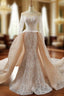 Champagne Mermaid Lace Long Sleeve Backless Train Wedding Dress