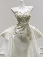 Elegant Ivory Mermaid Strapless Beaded Satin Wedding Dress With Train