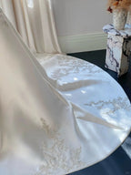 Elegant White Mermaid Strapless Beaded Satin Wedding Dress With Train