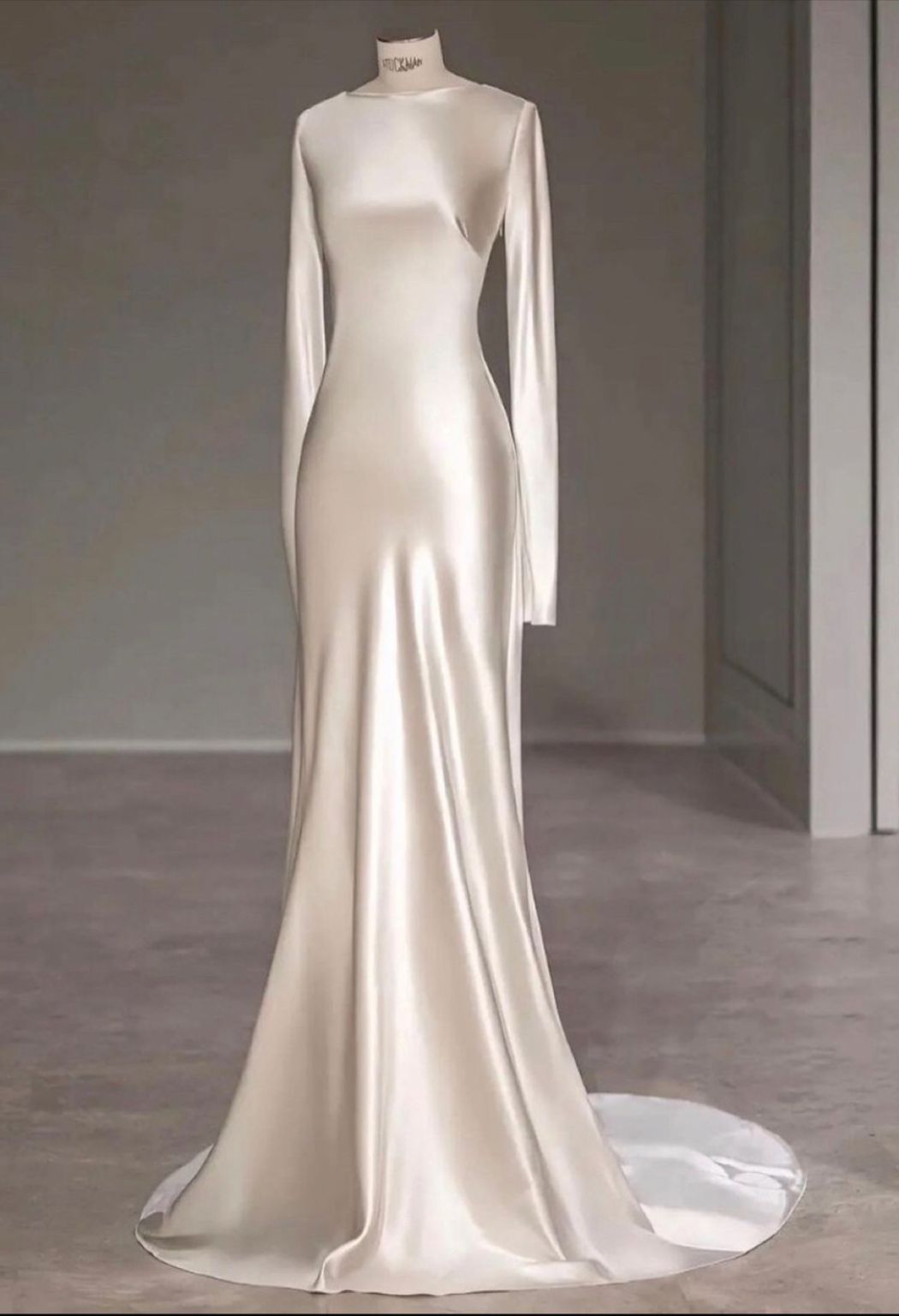Fairytale With Long Sleeves And Open Back Satin Wedding Dress Main image
