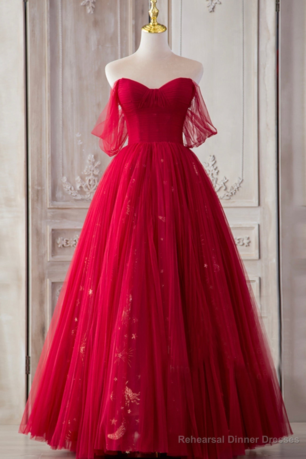 The Red Strapless Tulle Long A-Line Prom Dress is a showstopper. With its off-the-shoulder design and A-line silhouette, it perfectly blends elegance and allure. Main image