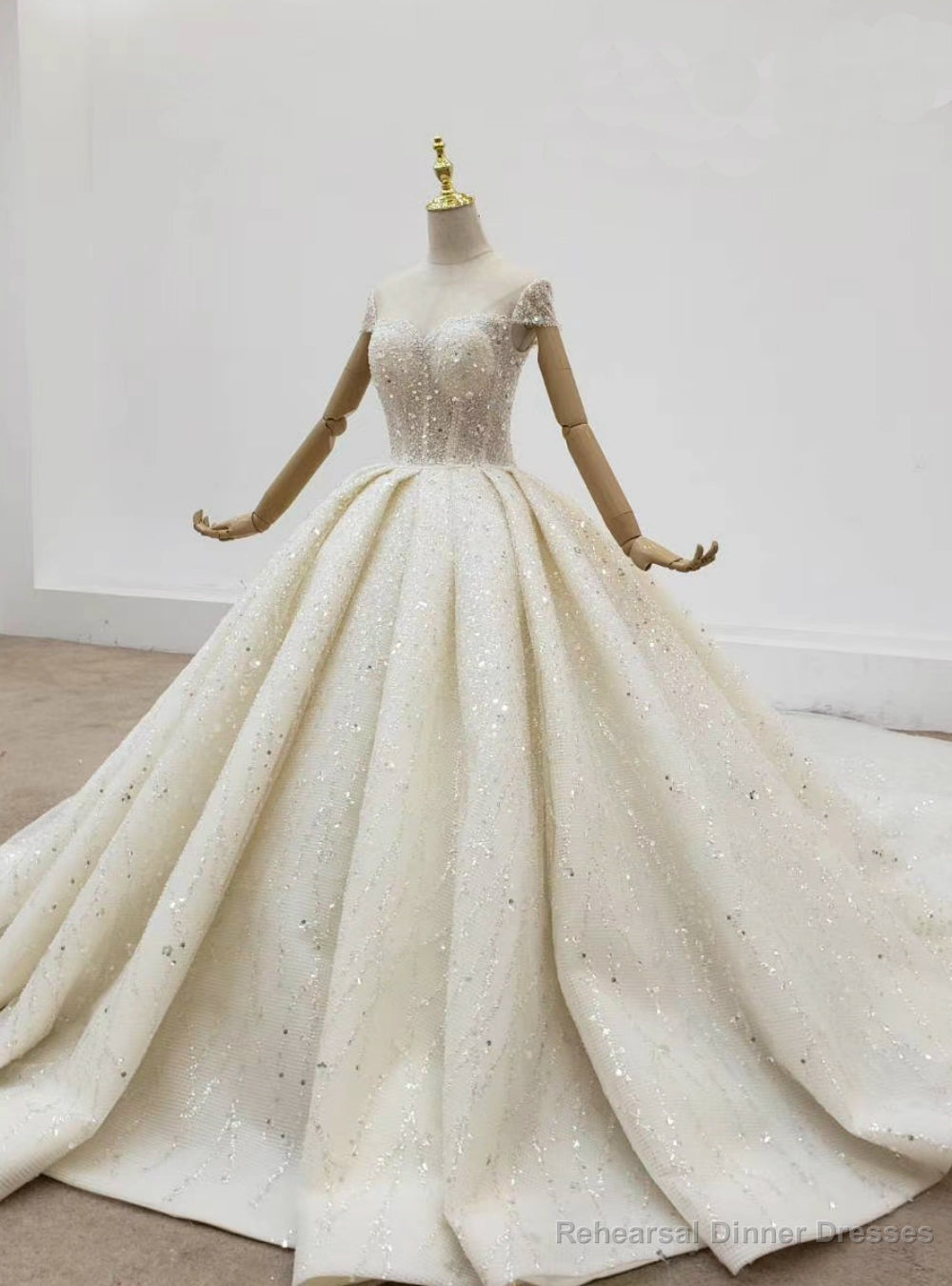 We Provide Champagne Tulle Sequins Cap Sleeve Backless Beading Wedding Dress Main image