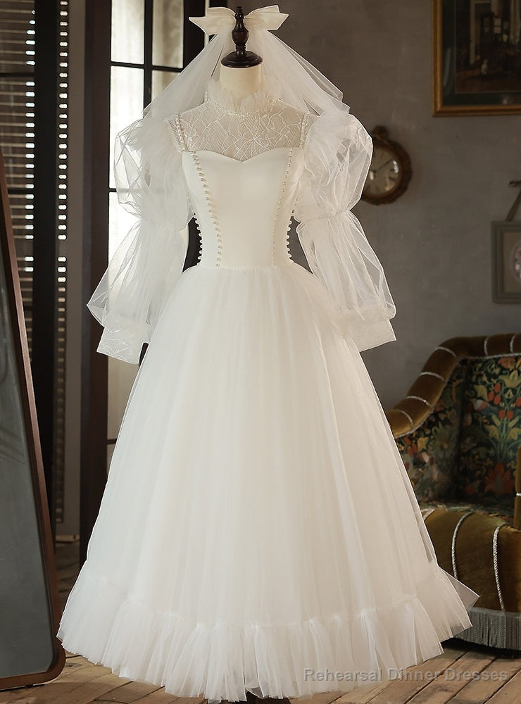 White Tulle Long Sleeve Pearls Wedding Dress Main image